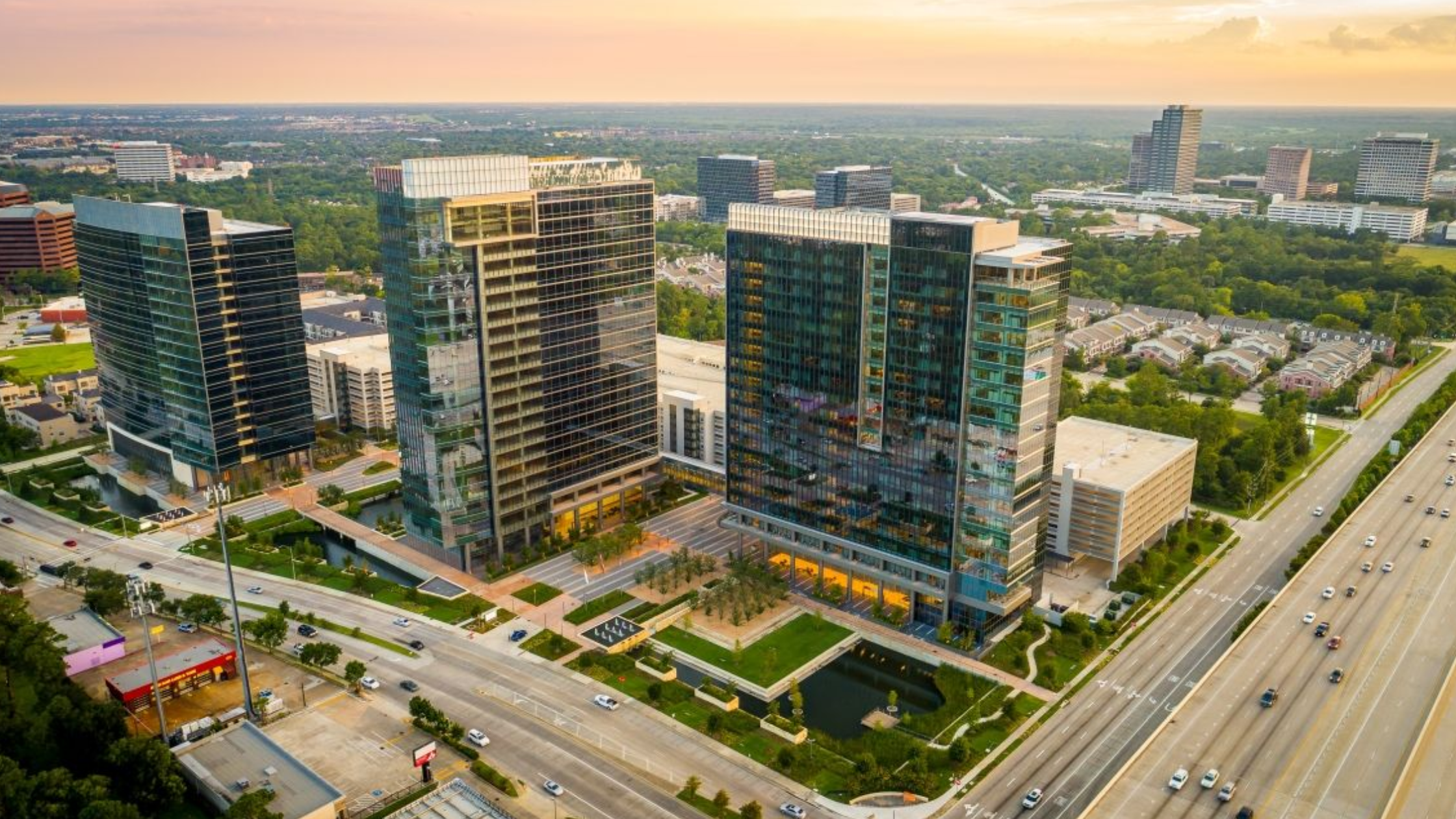 Office towers in Houston’s Energy Corridor, where businesses benefit from business Internet speeds that support growth.