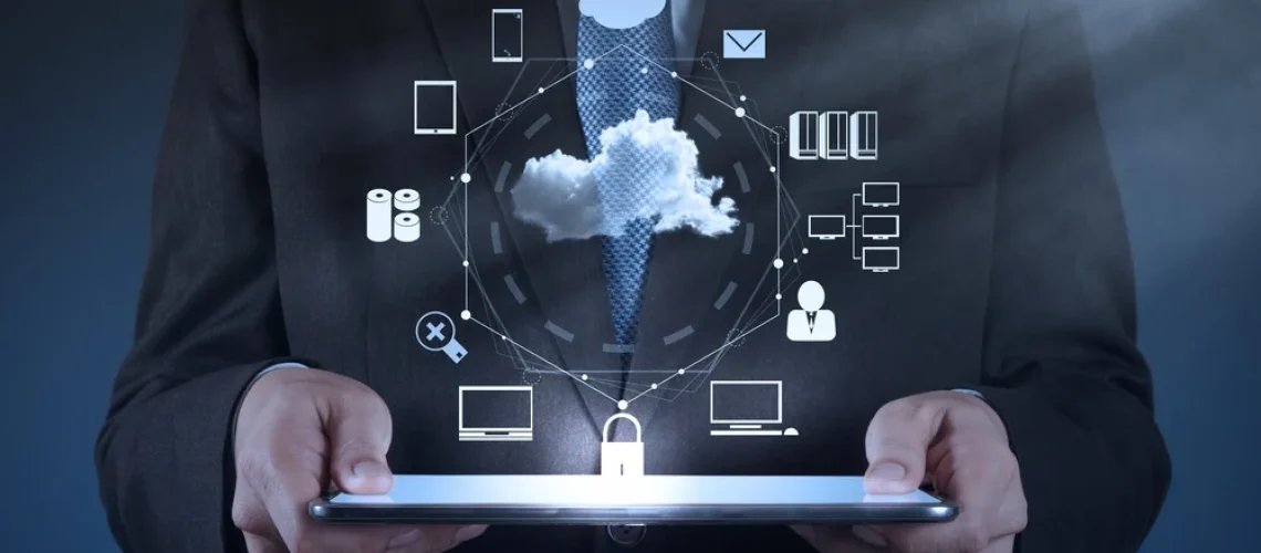 Businessman-hand-working-with-a-Cloud-Computing-diagram-on-the-new-computer-interface-as-concept-2