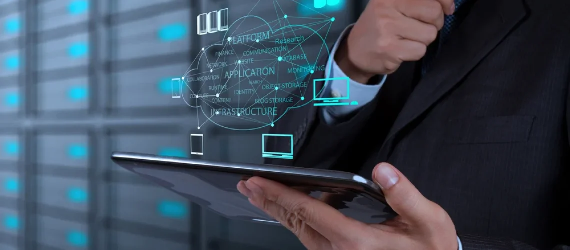 Businessman-hand-working-with-a-Cloud-Computing-diagram-on-the-new-computer-interface-as-concept