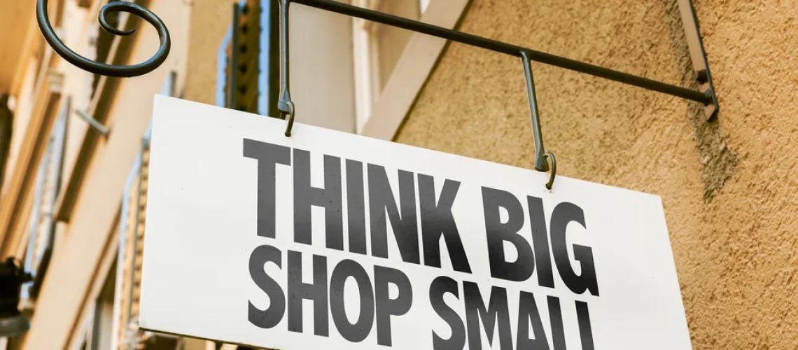 Think-Big-Shop-Small-sign-in-a-conceptual-image