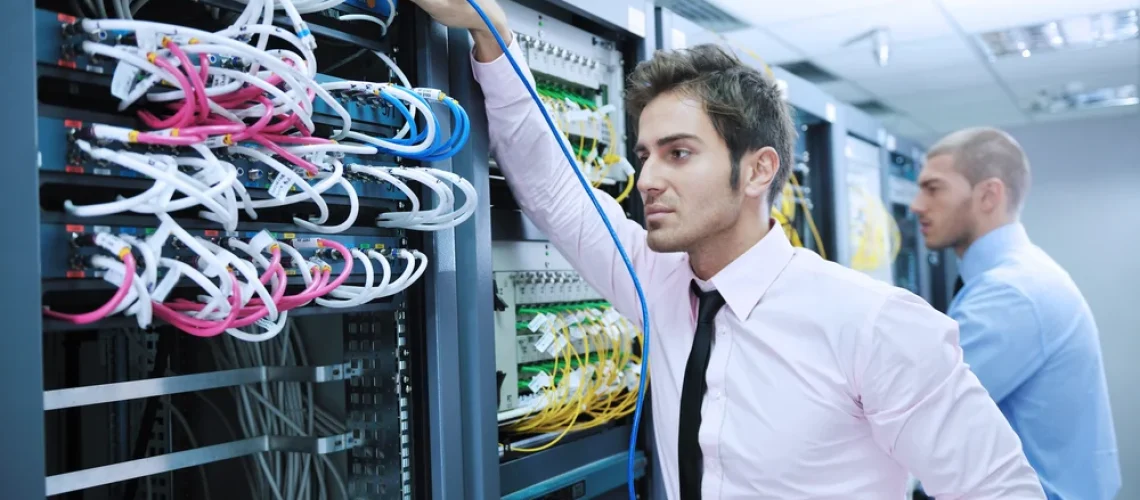 group-of-young-business-people-it-engineer-in-network-server-room-solving-problems-and-give-help-and-support
